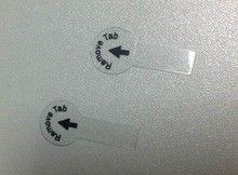 i01.i.aliimg.com_photo_v10_1366218591_1_Plastic_battery_pull_tab_for_CR2032_pull.jpg