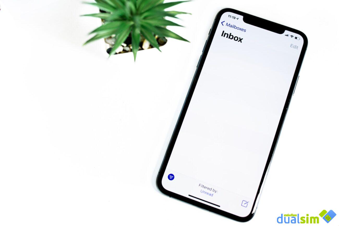 black iphone 5 on white surface